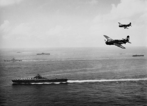 1280px-USS_Essex_(CV-9)_with_TG_38_3_off_Okinawa_1945