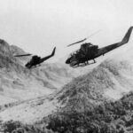 us_army_ah-1g_hueycobras_over_laos_1971