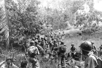 Marines_rest_in_the_field_on_Guadalcanal