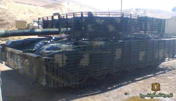 Syrian_army_tankers_to_upgrade_T-72M1_main_battle_tank_with_slat_armour_for_urban_warfare_640_001